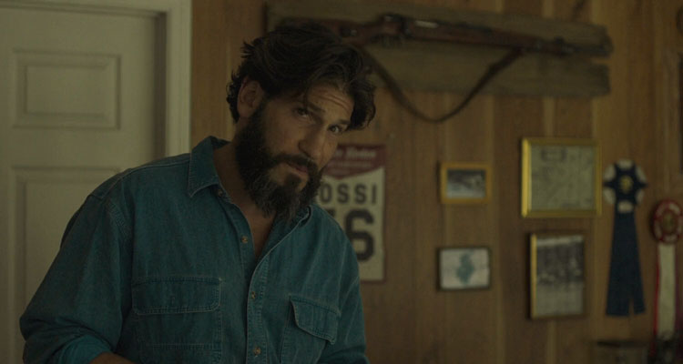 Sweet Virginia 2017 Movie Scene Jon Bernthal as Sam Rossi at the motel reception with a Karabiner 98k rifle hanging in the background