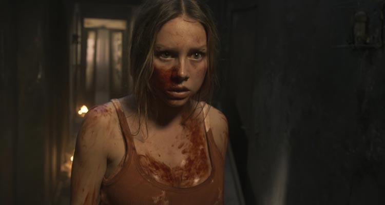 Venus 2022 Movie Scene Ester Expósito as Lucía bloody after fighting with the witches