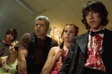 Dance of the Dead 2008 Movie Scene Jared Kusnitz as Jimmy, Greyson Chadwick as Lindsey, and Mark Oliver as Coach Keel realizing that prom is overrun with zombies