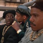 New Jack City 1991 Movie Scene Wesley Snipes as Nino Brown holding a bottle of crack cocaine and talking to Allen Payne as Gee Money and Bill Nunn as Duh Duh Duh Man