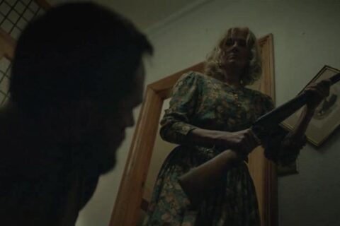 Little Bone Lodge 2023 Movie Scene Joely Richardson as Mama holding a shotgun