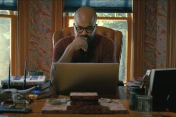 American Fiction 2023 Movie Scene Jeffrey Wright as Thelonious Monk Ellison writing his book My Pafology as a joke