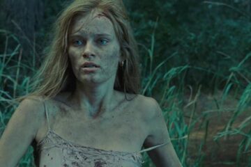 The Last House On The Left 2009 Movie Scene Sara Paxton as Mari running away from their attackers in the woods