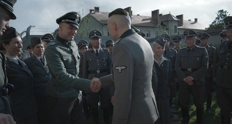 The Zone Of Interest 2023 Movie Scene Nazi's working at Auschwitz congratulating Christian Friedel as Rudolf Höss's birthday
