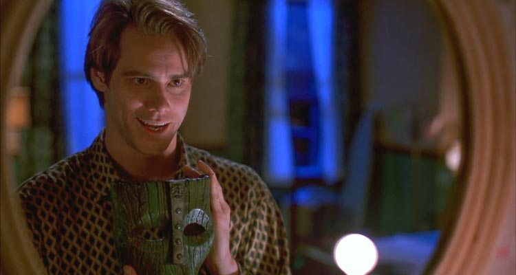 The Mask 1994 Movie Scene Jim Carrey as Stanley Ipkiss holding the mask and looking in the mirror