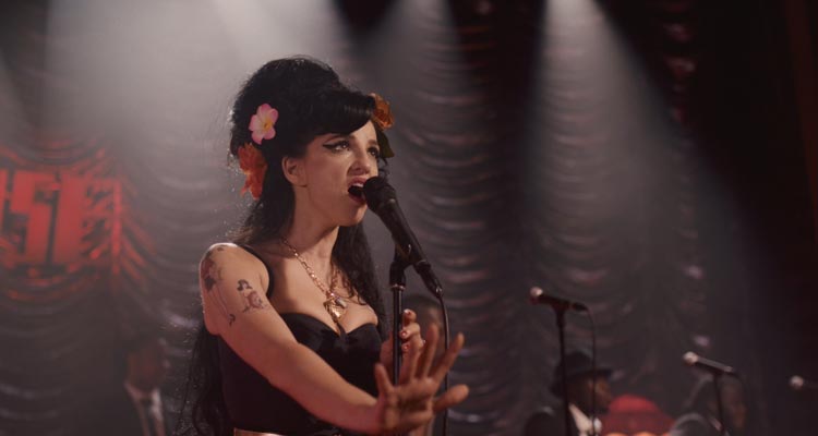 Back to Black 2024 Movie Scene Marisa Abela as Amy Winehouse singing on stage