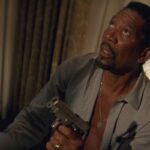 Kiss The Girls 1997 Movie Scene Morgan Freeman as Dr. Alex Cross holding a gun and chasing a serial killer in his hotel