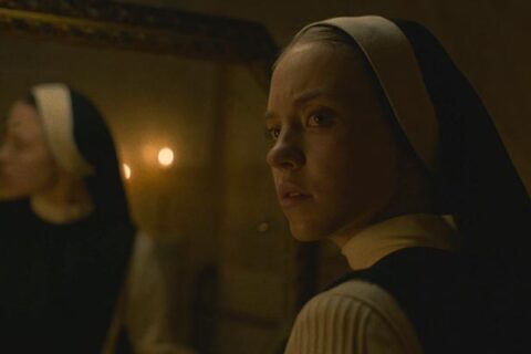 Immaculate 2024 Movie Scene Sydney Sweeney as Sister Cecilia hearing something strange in her room