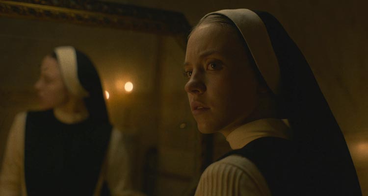 Immaculate 2024 Movie Scene Sydney Sweeney as Sister Cecilia hearing something strange in her room