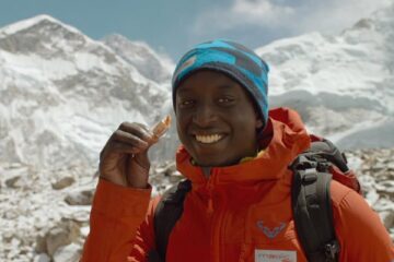 The Climb 2017 Movie Scene Ahmed Sylla as Samy Diakhaté trying to feed candy to an ox close to the Everest