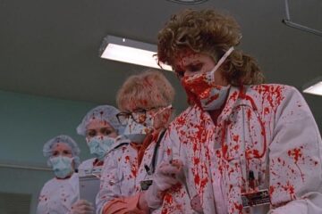 Blue Monkey 1987 Movie Scene Doctors covered in blood after a patient explodes in front of them