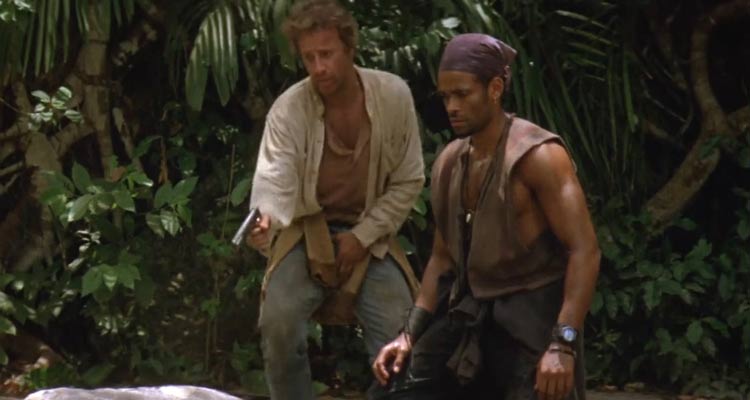 Gunmen 1993 Movie Scene Christopher Lambert as Dani Servigo and Mario Van Peebles as Cole Parker in the jungle running away from the bad guys