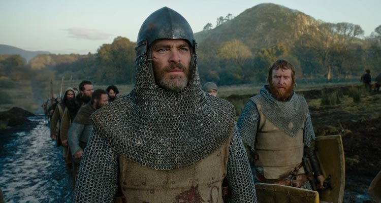 Outlaw King 2018 Movie Scene Chris Pine as Robert Bruce wearing his armor, shield and helmet about to enter the battle of Loudoun Hill