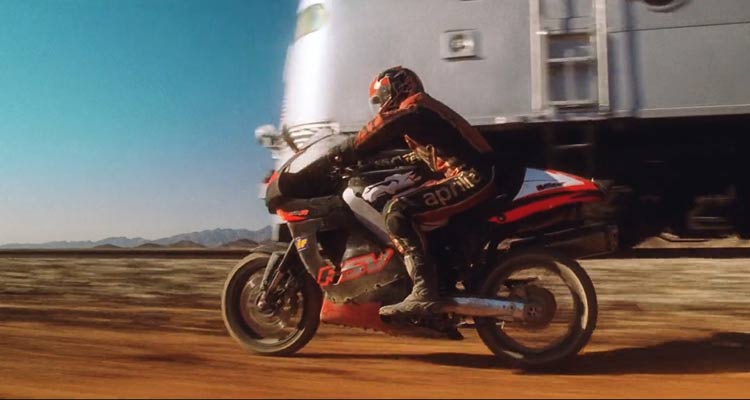 Torque 2004 Movie Scene Martin Henderson as Ford trying to overtake the train on his red red Aprilia RSV