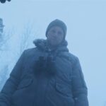 Cold Meat 2023 Movie Scene Allen Leech as David looking at his victim in the trunk of his car
