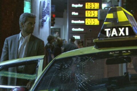 Collateral 2004 Movie Scene Tom Cruise as Vincent, the hitman, about to enter Max's taxi