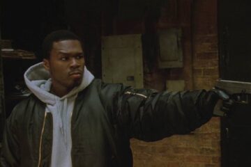 Get Rich or Die Tryin 2005 Movie Scene 50 Cent holding a gun during a robbery