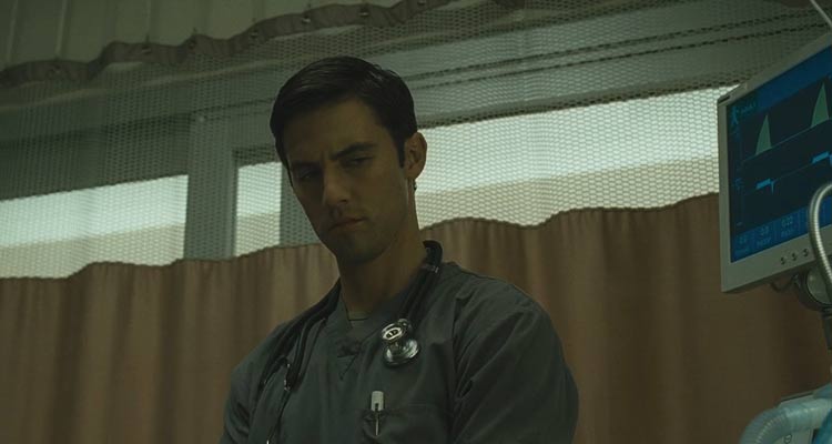 Pathology 2008 Movie Scene Milo Ventimiglia as Ted Grey wearing a stethoscope and about to kill his patient