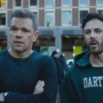 The Instigators 2024 Movie Scene Matt Damon as Rory and Casey Affleck as Cobby after the heist on the streets of Boston