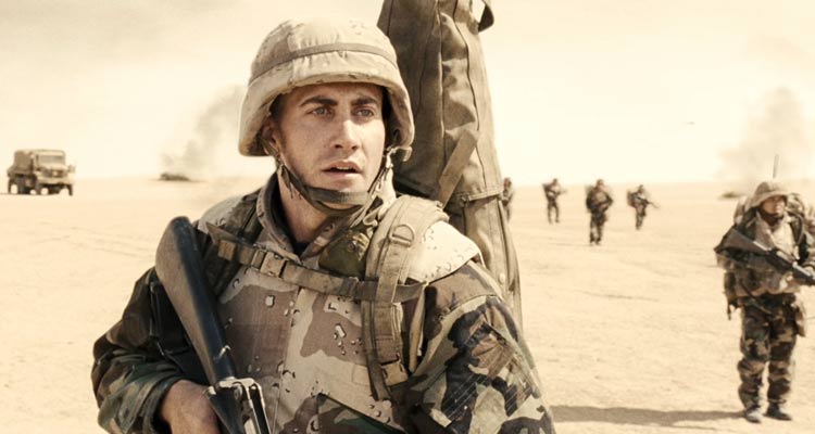 Jarhead 2005 Movie Scene Jake Gyllenhaal as Anthony Swofford in Iraq spotting something in the distance