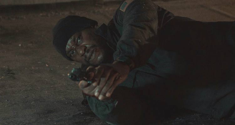 1992 Movie 2022 Scene Tyrese Gibson as Mercer Bey holding a gun