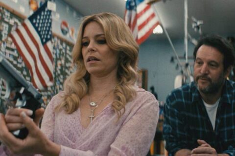Skincare 2024 Movie Scene Elizabeth Banks as Hope holding a gun in a gun store
