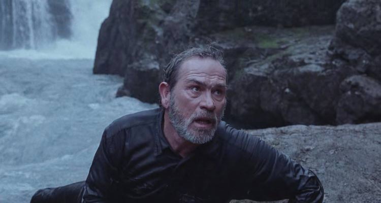 The Hunted 2003 Movie Scene Tommy Lee Jones as L.T. Bonham on the bank of the river looking for his target