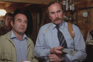 The Long Good Friday 1980 Movie Scene Bob Hoskins as Harold and P.H. Moriarty as Razors holding a huge knife