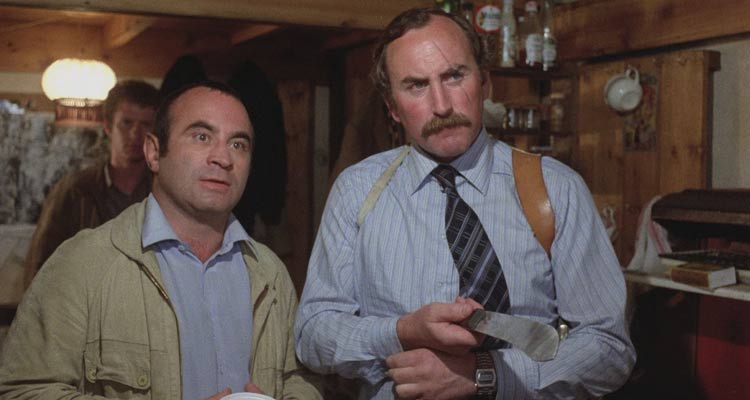 The Long Good Friday 1980 Movie Scene Bob Hoskins as Harold and P.H. Moriarty as Razors holding a huge knife