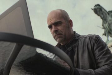 Code Name Emperor 2022 Movie Scene Luis Tosar as Juan spying on a politician using his computer