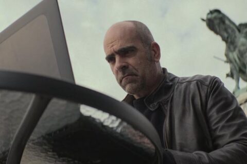 Code Name Emperor 2022 Movie Scene Luis Tosar as Juan spying on a politician using his computer