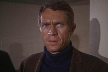 Bullitt 1968 Movie Scene Steve McQueen as Frank Bullitt looking for the bad guys at the airport