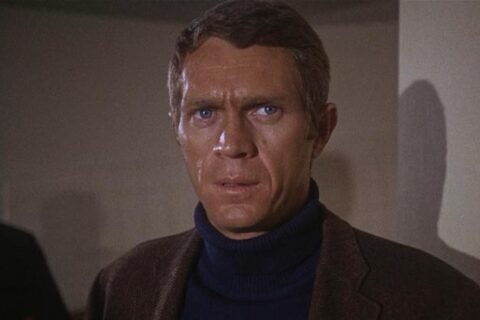 Bullitt 1968 Movie Scene Steve McQueen as Frank Bullitt looking for the bad guys at the airport
