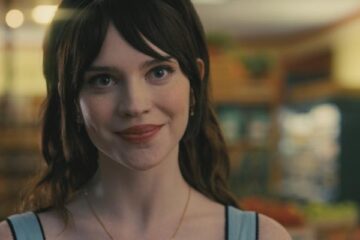 Companion 2025 Movie Scene Sophie Thatcher as Iris in the supermarket falling in love with Josh
