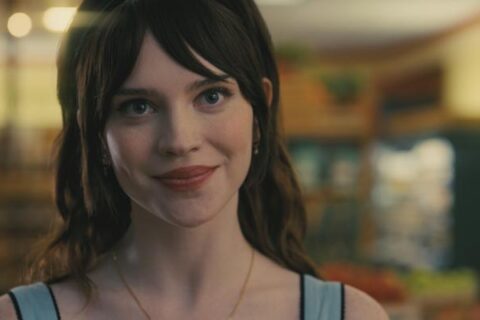 Companion 2025 Movie Scene Sophie Thatcher as Iris in the supermarket falling in love with Josh