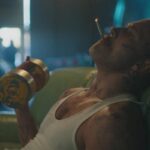 5lbs of Pressure 2024 Movie Scene James Oliver Wheatley as Sicky smoking and working out in the garage