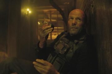 A Working Man 2025 Movie Scene Jason Statham as Levon Cade throwing a grenade at the bad guys