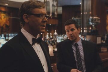 Broken City 2013 Movie Scene Russell Crowe as Mayor Nicholas Hostetler and Mark Wahlberg as Billy Taggart talking in the bar