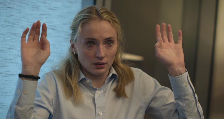 Steal 2026 Series Scene Sophie Turner as Zara Dunne with her hands up in the office during the heist