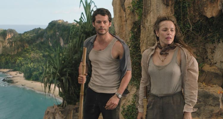 Send Help 2026 Movie Scene Rachel McAdams as Linda Liddle and Dylan O'Brien as Bradley Preston standing on the edge of the cliff on an uninhabited island