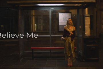 Believe Me 2026 Series Scene Miriam Petche as Carrie waiting for a black cab at the bus stop late at night