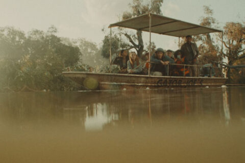 Hungry 2026 Movie Scene Tourists in a boat waiting to see gators with a killer hippo lurking in the water