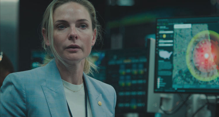 A House of Dynamite 2025 Movie Scene Rebecca Ferguson as Captain Olivia Walker realizing that a nuclear warhead is heading to the US