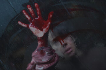 Bring Her Back 2025 Movie Scene Sally Hawkins as Laura drawing a circle in blood on the window in an occult ritual